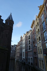 Typical houses in Amsterdam next to canal