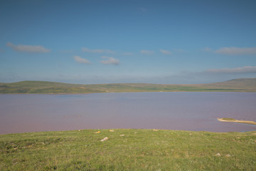 The movement of clouds in the spring in the steppe part of the Crimea peninsula at Cape Opuk.