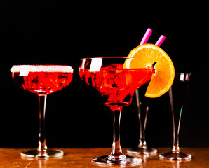 Tasty and colorful drinks based on various alcohols, syrups and liqueurs, unique effect of the bartender's work