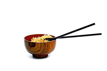 Instant noodles and cup isolated on white background.Instant noodles for people Do not like to eat vegetables.Instant noodles in black cup on white background.