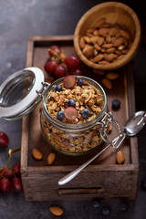 Granola with berries, nuts and seeds, energy snack or healthy breakfast concept
