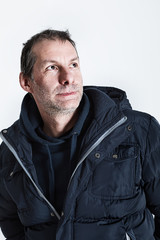 portrait of a forty-five year old man in studio on a white background