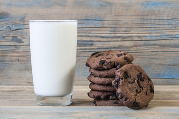Tasty chocolate cookies with glass of milk