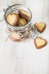 Heart-shaped cookies in a glass jar