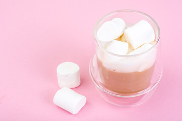 White marshmallow on pink background