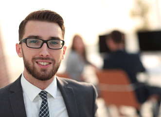 Fototapeta premium closeup.Executive businessman on background of office.