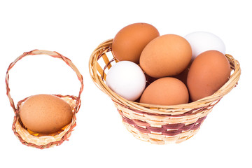 Preparation for Easter. Chicken eggs in wicker basket