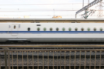 The train runs from the station to the city.