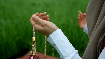 Praying and muslim girl