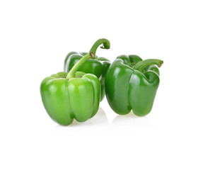 fresh green bell pepper (capsicum) on a white background