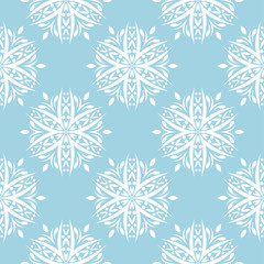 White floral seamless pattern on blue background