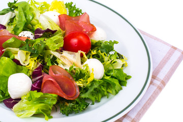 Italian salad with Parma ham and mozzarella