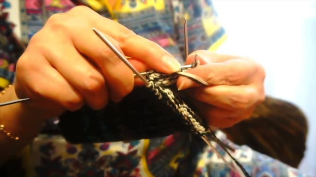 woman knit wool socks , slow motion
