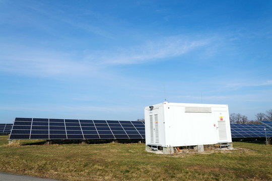 Distribution point at solar panels photovoltaics power station farm, future innovation energy concept, clear blue sky background, Czech Republic