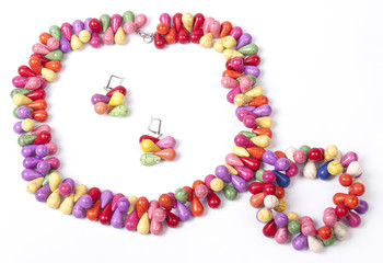 Necklace with stones on a white background. Bijouterie. Women's accessories. Necklace on the neck. Valuable jewelry.Decorating for women.Women's accessories isolated white background