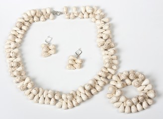 Necklace with stones on a white background. Bijouterie. Women's accessories. Necklace on the neck. Valuable jewelry.Decorating for women.Women's accessories isolated white background