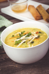 delicious thai curry coconut chiken soup bowl