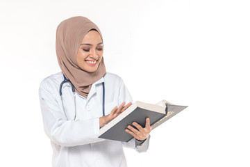 Hijab medical doctor with blue book. Healthy concept.