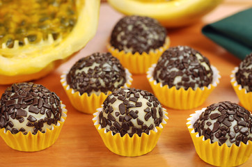 Traditional Brazilian chocolate candy called brigadeiro in white chocolate and passion fruit gourmet version