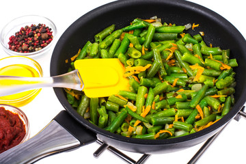 Green beans with onions and carrots. Delicious balanced nutrition concept