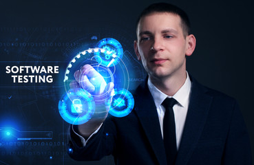 Business, Technology, Internet and network concept. Young businessman working on a virtual screen of the future and sees the inscription: Software testing