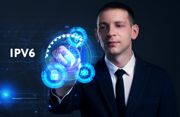 Business, Technology, Internet and network concept. Young businessman working on a virtual screen of the future and sees the inscription: IPv6