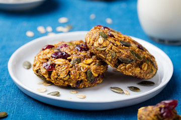 Pumpkin, oat cookies with cranberries, glass milk