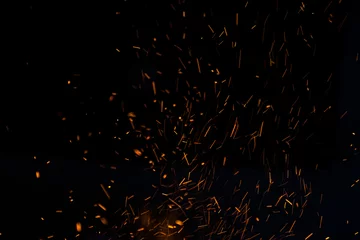 Foto op Plexiglas De vlammen van de duisternis zweven in de lucht. Vuur houtskool. © nattapon