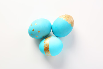 Dyed Easter eggs on white background