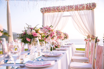 Table setting at a luxury wedding and Beautiful flowers on the table. - 191371230