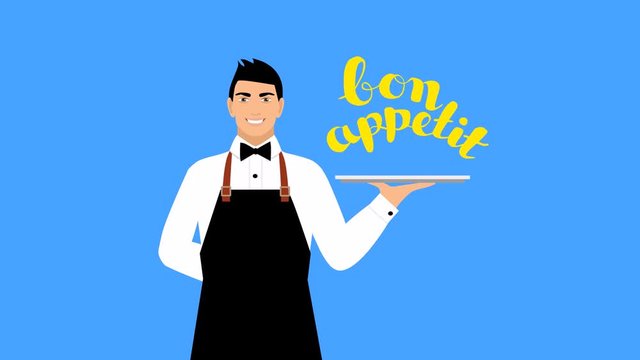 A young smiling waiter in an apron with a tray in his hand. The inscription on the background of a "bon appetite". footage