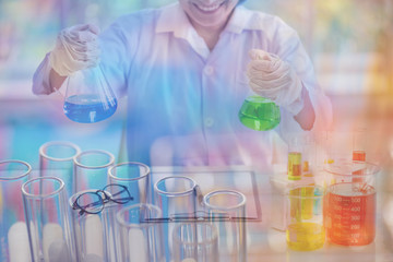 scientist holding laboratory test tube in hand , science research concept