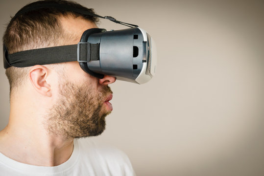 Adult man wearing vr goggles