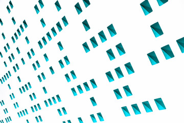 green shapes on white wall