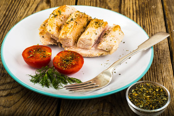 Boiled chicken fillet and tomatoes cherry-healthy diet food, protein lunch and dinner