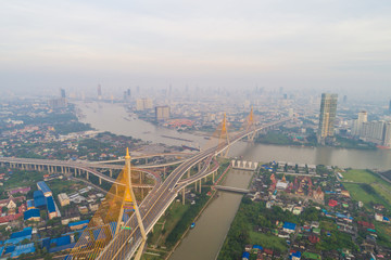 Modern bridge architecture with Chao phra ya river during sunrise