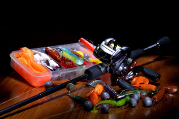 Fishing rod on a brown background