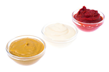 Set of three classic sauces-mayonnaise, ketchup and mustard