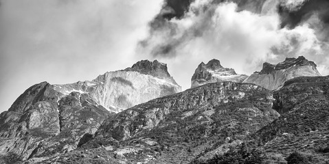 Fototapeta na wymiar Black and white panoramic picture of the Cuernos del Paine rock formations in the Torres del Paine National Park, Chile.