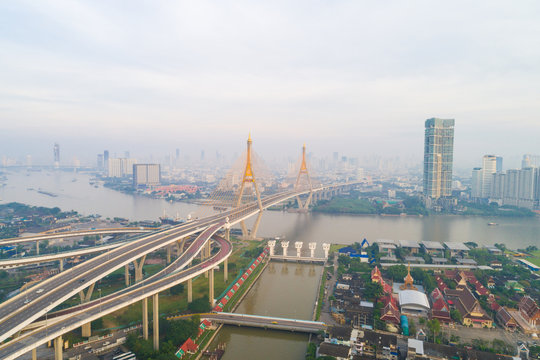 Modern bridge architecture with Chao phra ya river during sunrise