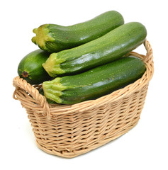 zucchini courgette Isolated in basket on white
