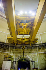 Bottom view of industrial polar rotary crane of bridge type. Construction of dome 