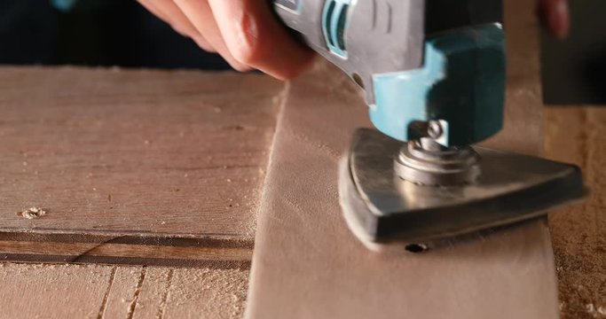 Wood grinder by electric hand router