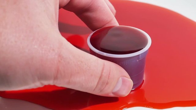 Overdose on Drugs Represented by Overflowing Cup Slow Motion