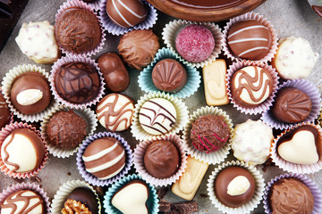 a lot of variety chocolate pralines, belgian confectionery gourmet chocolate
