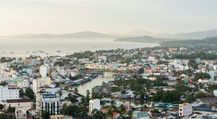 Fototapeta na wymiar DUONG DONG, PHU QUOC, VIETNAM - NOVEMBER 14, 2017: Panoramic view from the high on town, sea, bay and hills