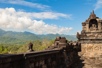 Fototapeta premium View from buddist temple Borobudur complex to mountains. Candi Borobudur, Yogyakarta, Central Jawa, Indonesia.