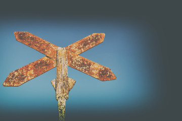 road sign of the railway antique in the empty sky