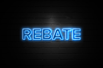 Fototapeta premium Rebate neon Sign on brickwall