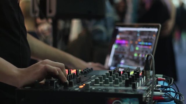 DJ audio mixer works on the event
